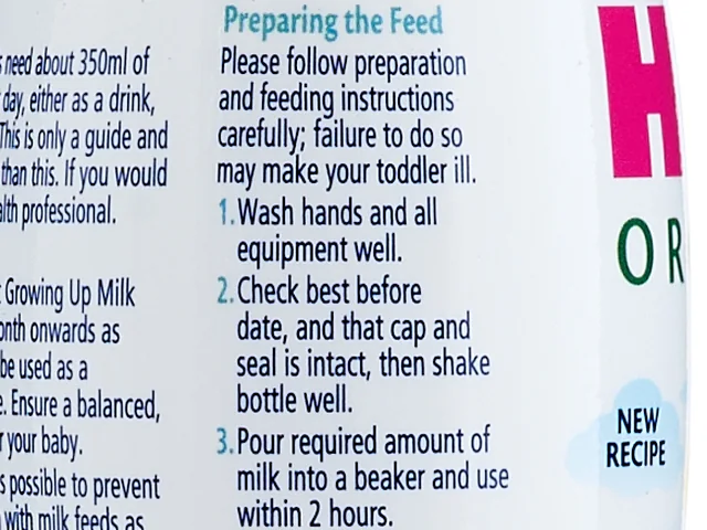 The preparation steps on the side of the Growing Up Milk bottle